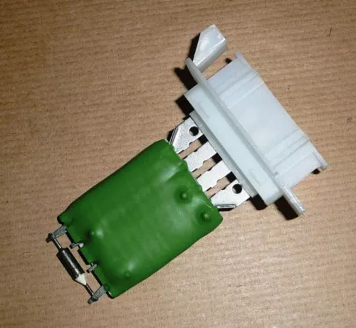 The air conditioning control module is located next to the blower in the house/see 6450NV